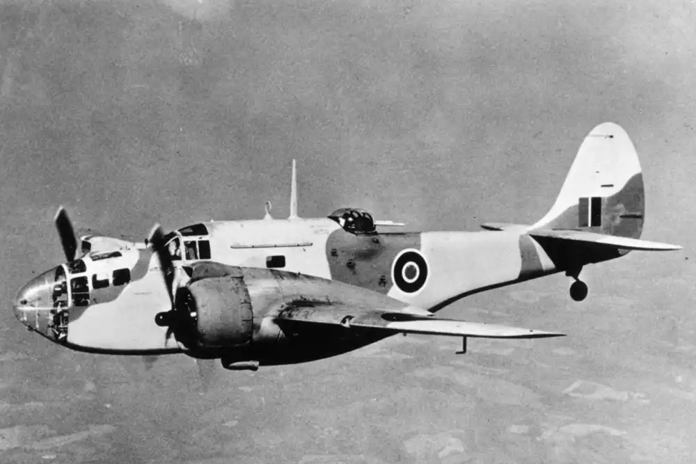 A black and white photograph of a WWII era Baltimore bomber in flight 