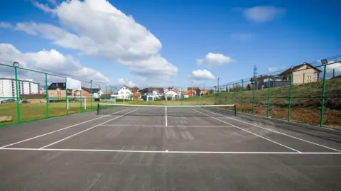 The Municipality of Podujeva All weather tennis court built in Kosovo.