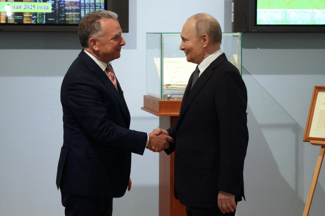 In this photograph distributed by the Russian state agency Sputnik, Russia's President Vladimir Putin shakes hands with US President Donald Trump's envoy Steve Witkoff during a meeting in Saint Petersburg on April 11.