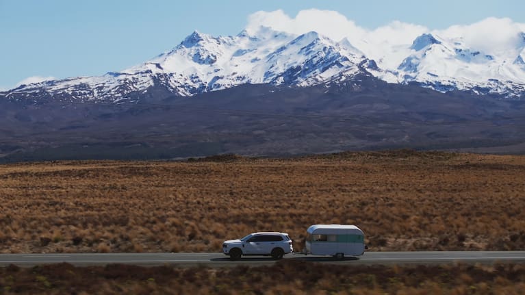 Celebrity chefs Manu Feildel and Colin Fassnidge on the road with their caravan in tow.