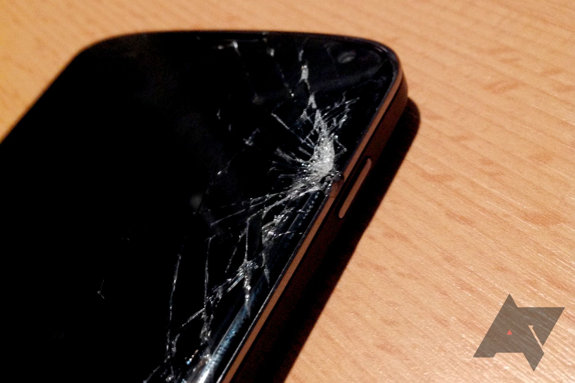 Phone with a broken and shattered display