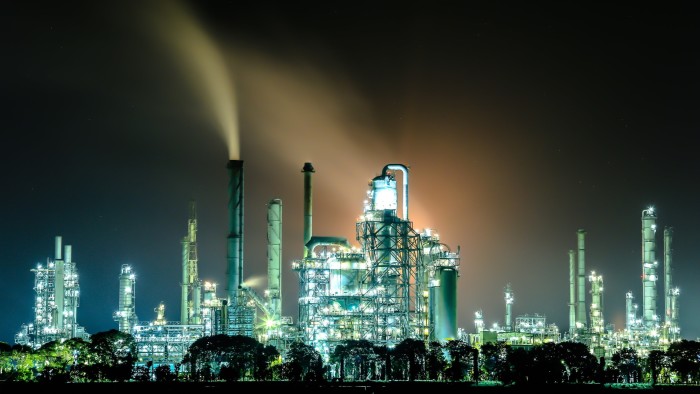 Vladimir Putin’s war chest under threat as oil prices slide A night landscape of Omsk oil refinery in Russia