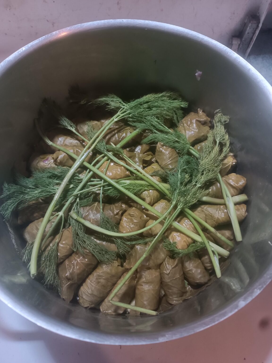 I wrap dolmades.