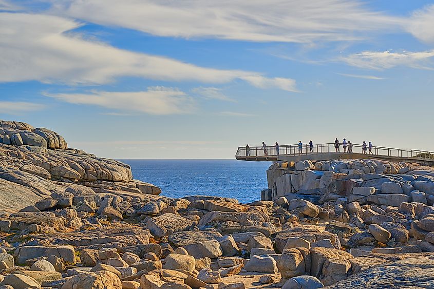 People gather at a viewpoint along the coastline of Albany, Western Australia