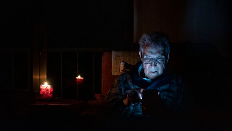 A man relies on candlelight amid the blackout in Spain.
Pic: AP/Euopra Press