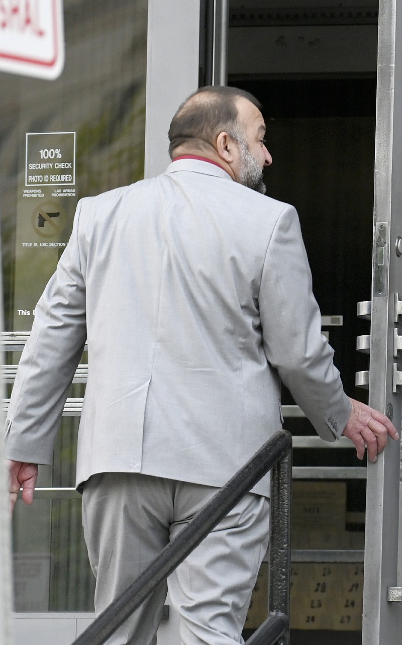Staff photo by Abby White / Sead Miljkovic enters the Chattanooga federal courthouse for his trial. He was found not guilty Friday of the torture charges against him.