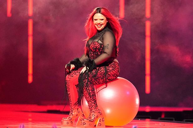 Woman sat on ball