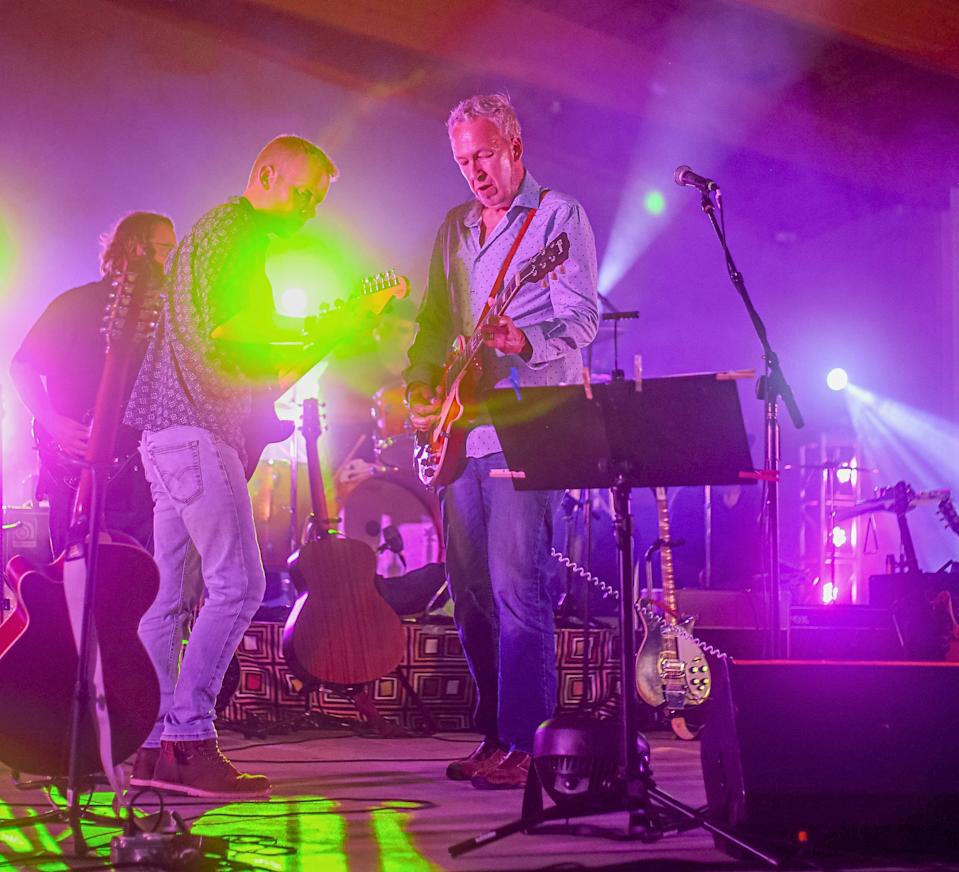 Long & Winding Road Tour performs at Humiston-Riverside Park in August 2022 as part of the Rockin' at the River concert series.