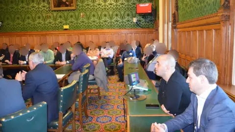 Facebook Orlin Roussev, front right, and Biser Dzhambazov, seated next to him, present in Committee Room 6 of the House of Commons
