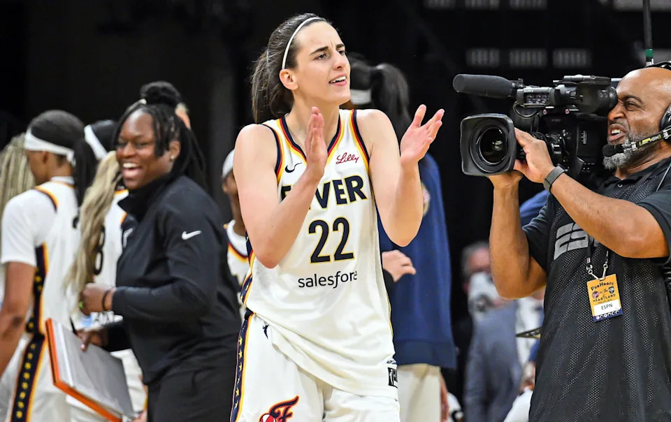 Indiana Fever guard Caitlin Clark (22) reacts during the third quarter against the Brazil National Team at Carver-Haweye Arena.Jeffrey Becker-Imagn Images