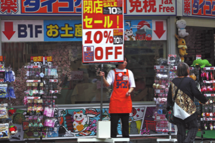 Japan's economy shrinks, fueling fear of recession - World