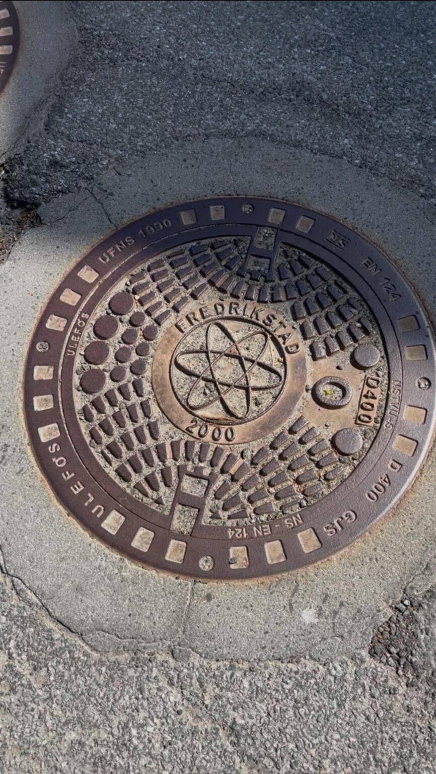Does anyone know what the symbol in this manhole cover represents?