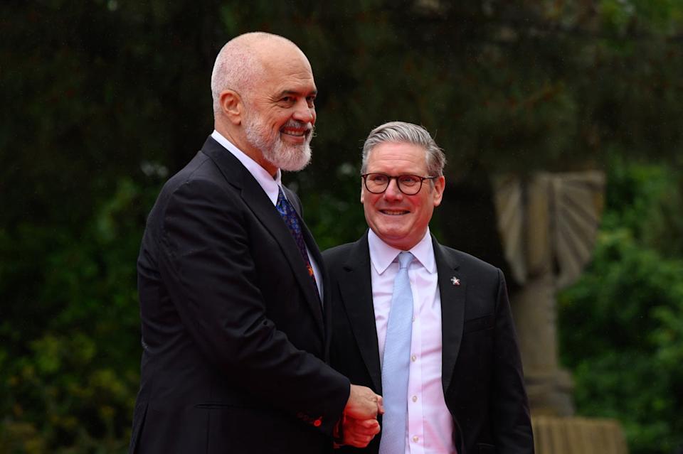 Albanian Prime Minister Edi Rama (L) welcomes British Prime Minister Keir Starmer as he arrives at the 6th European Political Community summit on May 16, 2025 at Skanderbeg Square in Tirana, Albania. (Getty Images)