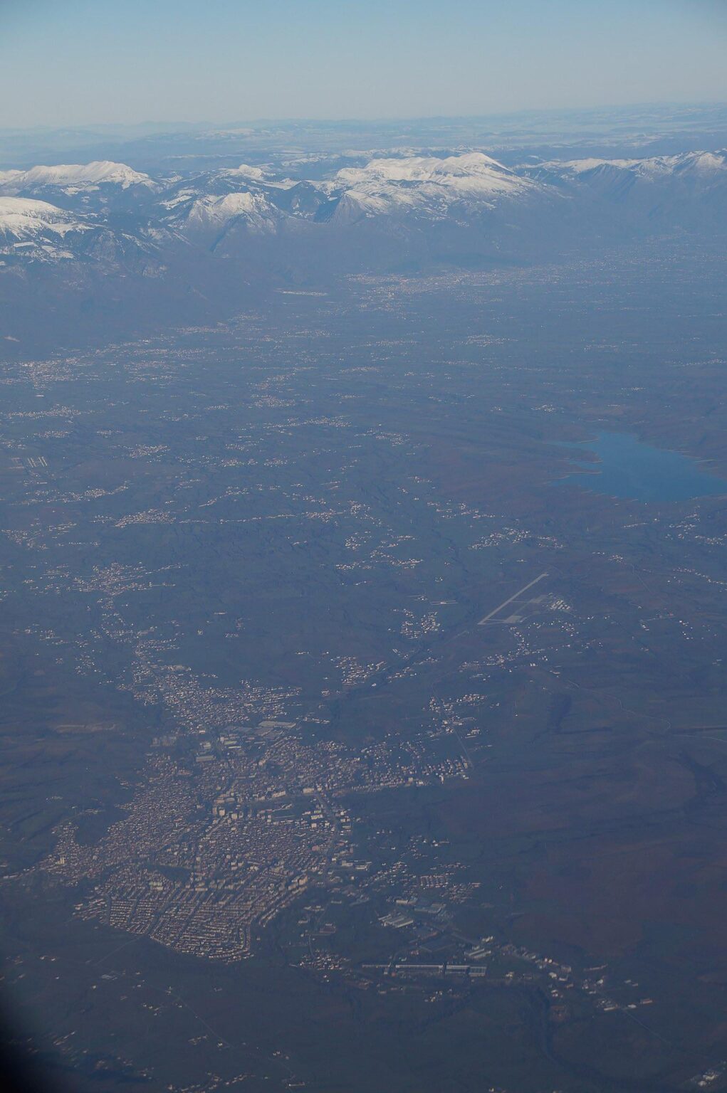 Gjakova, its airport, Dukagjini Lake and Albanian Alps 🏔️☀️