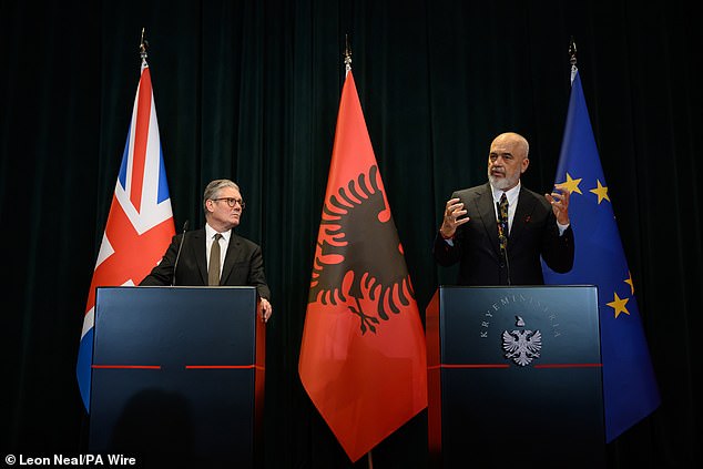 Sir Keir Starmer looks up at 6ft 7in Albanian Prime Minister Edi Rama during the joint press conference in Tirana
