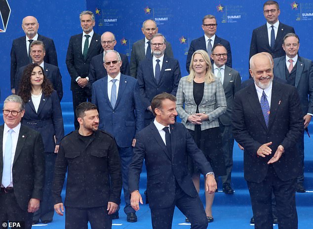 Mr Rama was joking around with Macron, Starmer and Zelensky, whom he loomed over in the front row today