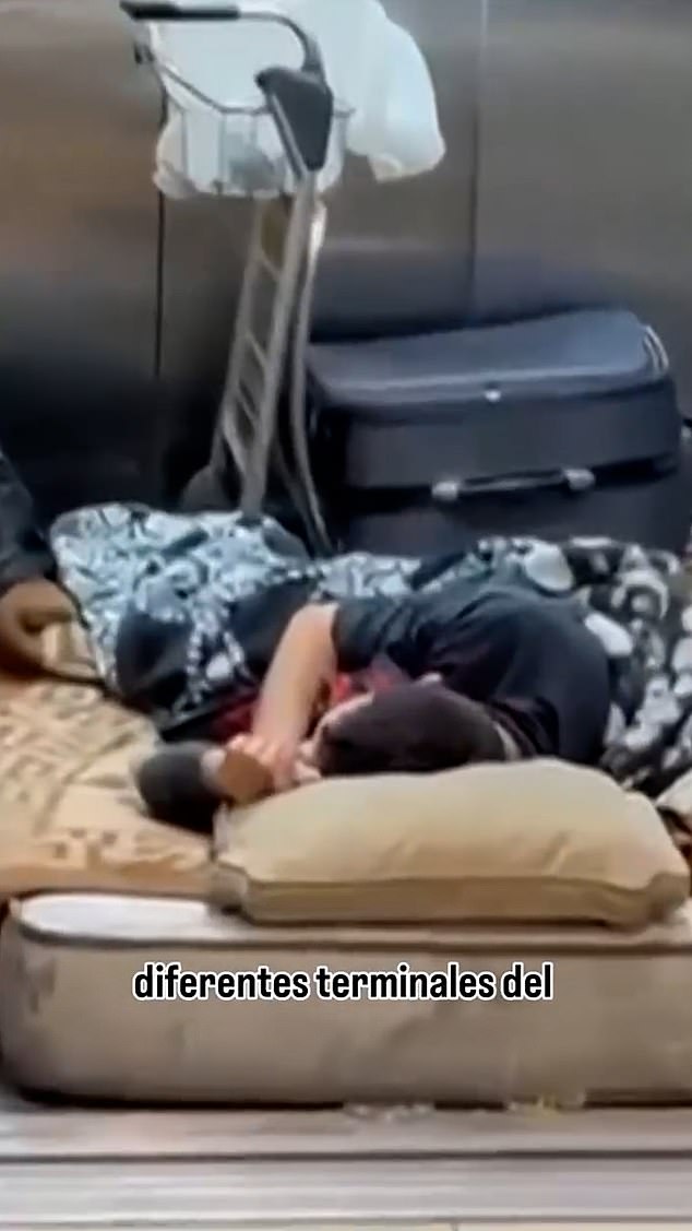 In the latest set of images released of the airport crisis, one rough sleeper lying in a make-shift bed inside a lift