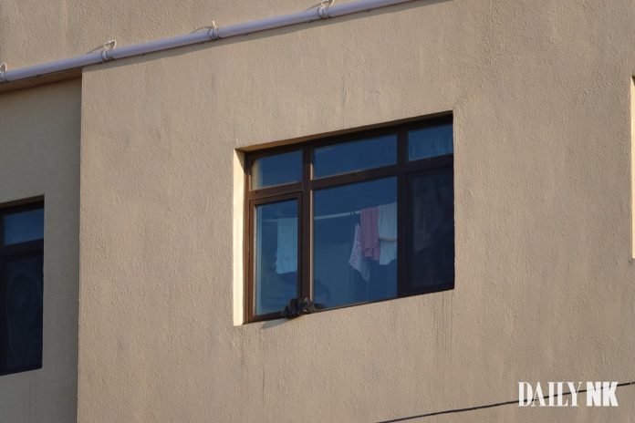 factory china north koreans Window of a Chinese factory where North Koreans work.