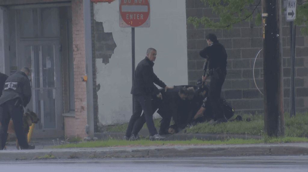Man chased down and arrested after standoff at Greece apartment