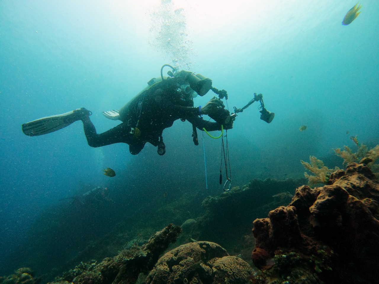 Mongabay's program manager Ridzki R Sigit shooting the underwater world in Northern Bali