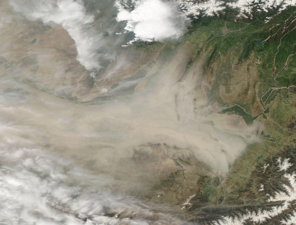 A NASA satellite image captures a massive dust storm sweeping across northern Afghanistan, highlighting the region's escalating environmental crisis. (Photo Credit: NASA)