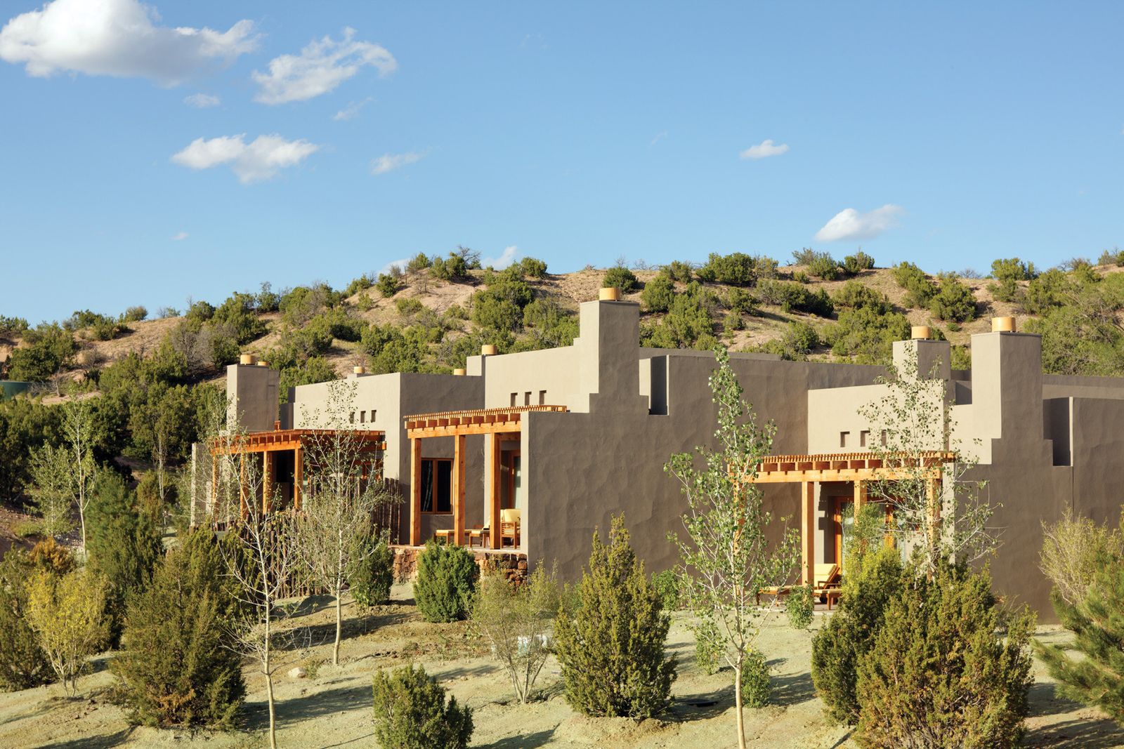 Image may contain Architecture Building House Housing Villa Hotel Resort Hacienda Plant and Vegetation
