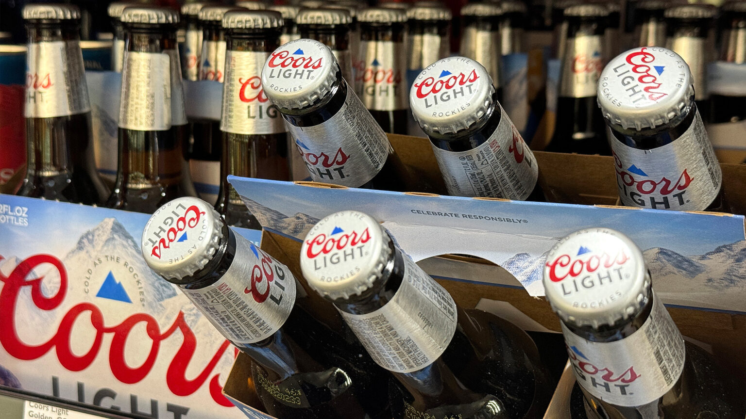 The maker of Coors Light and Miller is attributing lower revenue to macroeconomic trends and weaker demand.