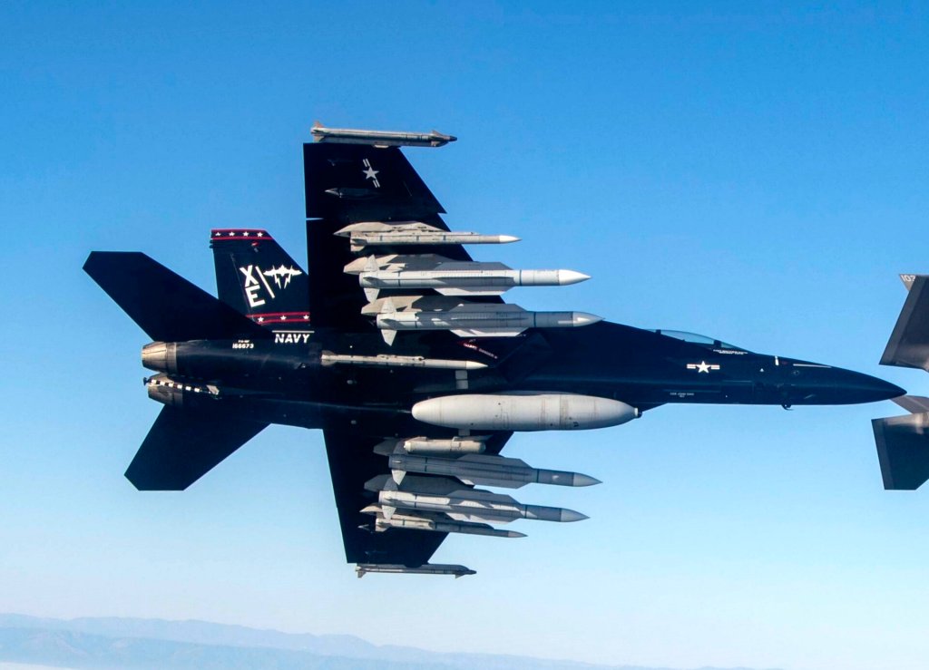 A U.S. Navy F/A-18F and F-35, both assigned to Air Test and Evaluation Squadron (VX) 9, fly over the Point Mugu Sea Range in Southern California with a U.S. Air Force F-15 during Gray Flag 2024 on Sept. 24, 2024. Gray Flag is an annual large-force test event that brings the joint force together to test and evaluate multi-domain systems in a maritime environment, ensuring our nation’s warfighters are equipped with effective, interoperable systems that will help them deter aggression, protect our nation’s prosperity and security, and return home safely to their families. (U.S. Navy photo by Lt. Cmdr. Kory Hughs)