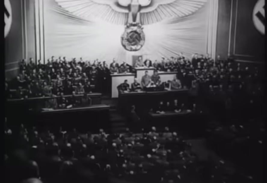 A shot on which Hitler ridiculed Ruzvelt's list of countries that Germany should not attack. (Among them Yugoslavia, of course.)