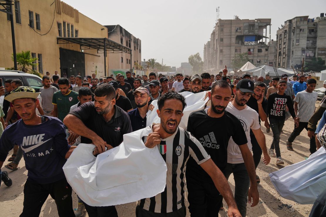 Palestinians carry the bodies of their relatives killed in an Israeli airstrike, during their funeral in Khan Younis, in southern Gaza on Sunday, May 18, 2025.