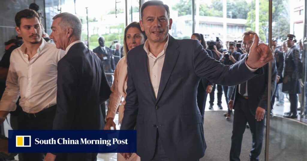 Portuguese PM’s centre-right party claims election win, falls short of majority Portuguese PM’s centre-right party claims election win, falls short of majority