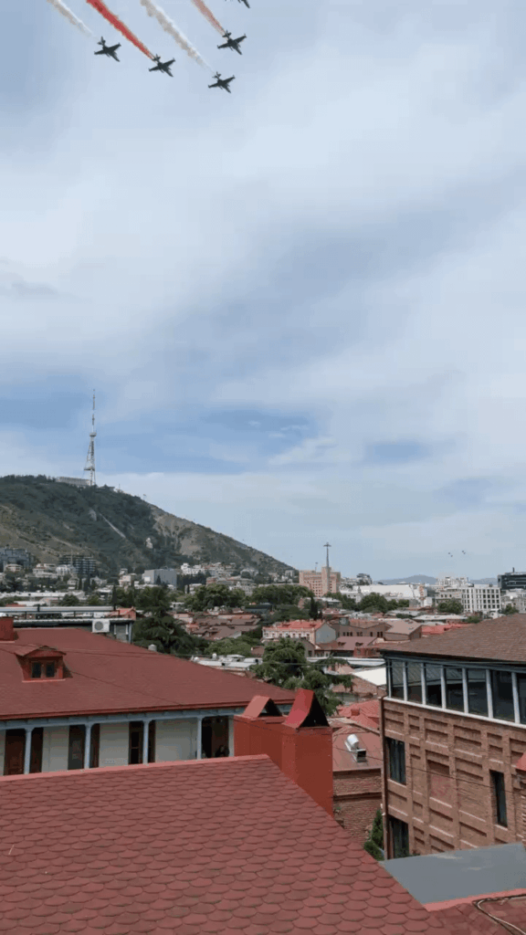 Georgian Su-25s paint the sky with national flag colors over Tbilisi for Independence Day