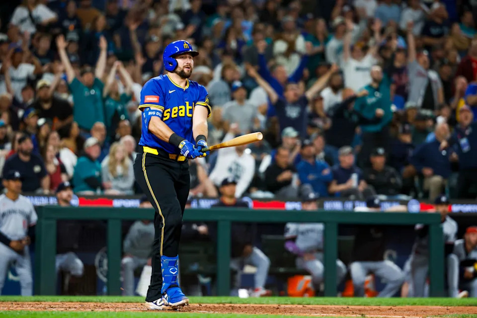 Seattle Mariners catcher Cal Raleigh (29) hits a two-run home run against the Minnesota TwinsJoe Nicholson-Imagn Images