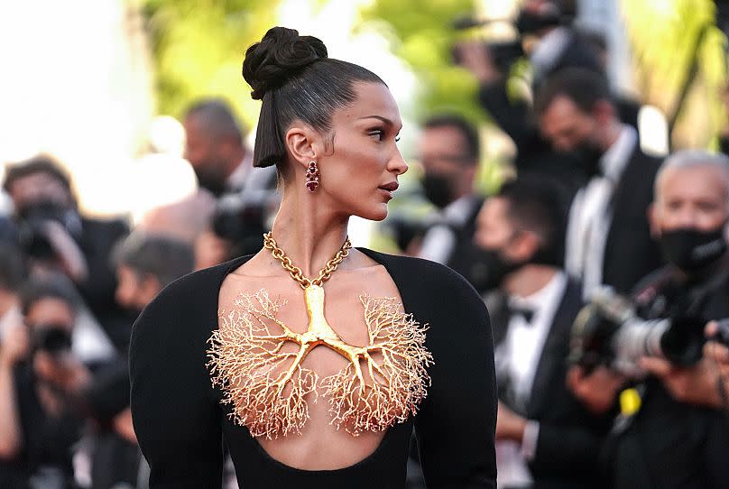 Bella Hadid poses for photographersat the premiere of 'Three Floors' in Cannes - 2021