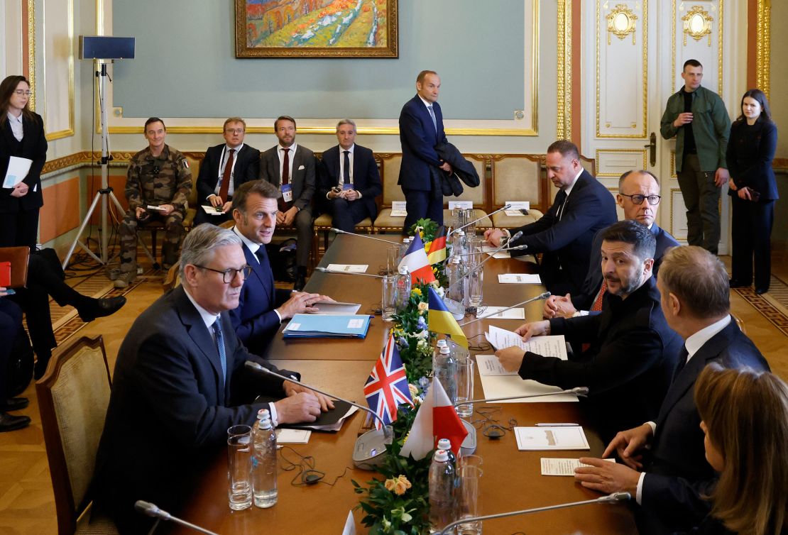 Ukraine's President Volodymyr Zelensky, at right, seated with the leaders of Britain, France, Poland and Germany for a meeting at the Mariinskyi Palace, the official residence of the president of Ukraine, in Kyiv on Saturday.