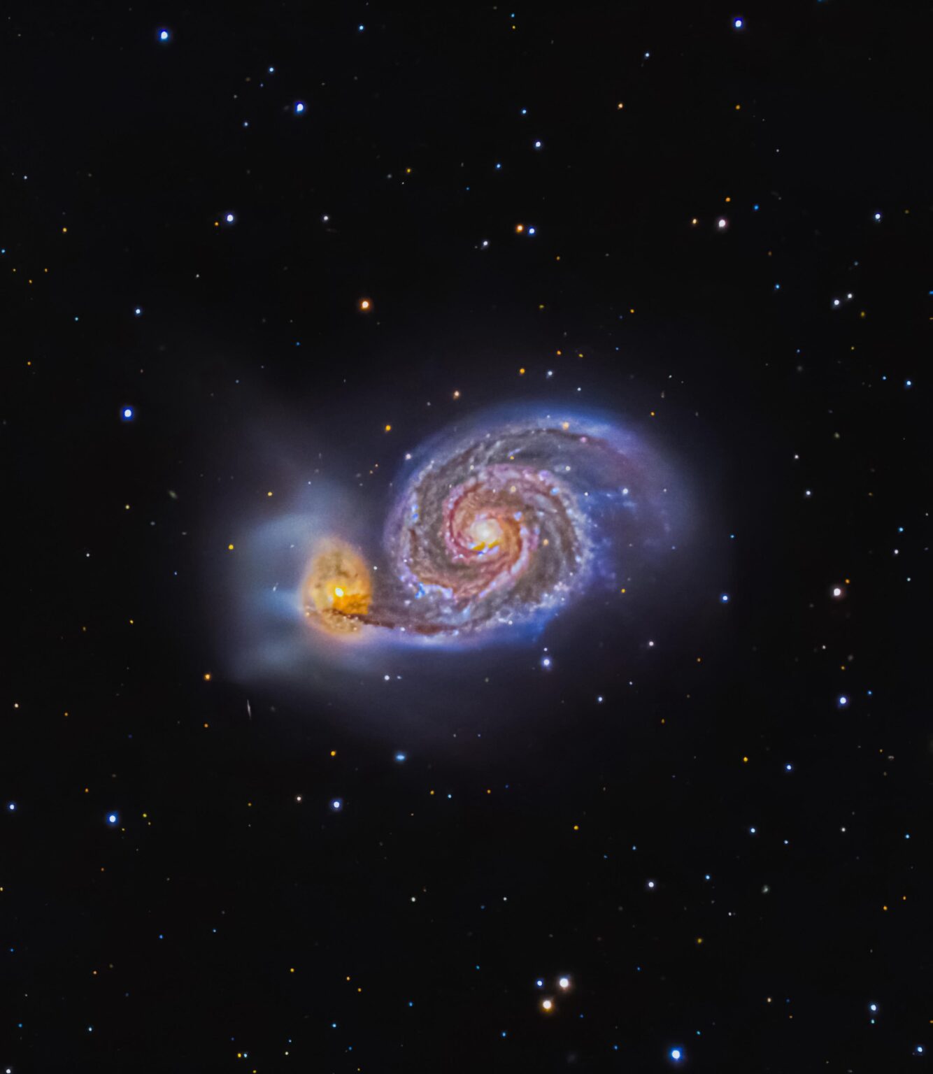 The Whirlpool Galaxy, 30 Million Light Years away. Over 8 Hours of Exposure Taken With Multiple Telescopes.