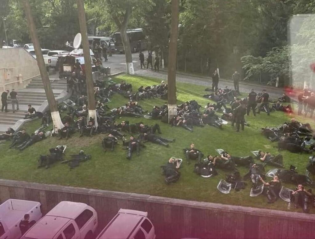 Exhausted robocops after beating up the protesters the whole night in Tbilisi, May-2024