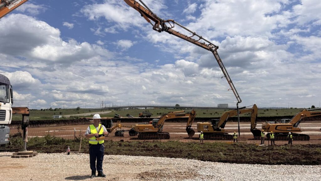 Turkish firm launches plant project in N. Macedonia to create up to 1,000 jobs A construction worker stands in front of heavy machinery during the groundbreaking ceremony for the new Sahterm factory in Skopje, North Macedonia, on May 17, 2025. (AA Photo)
