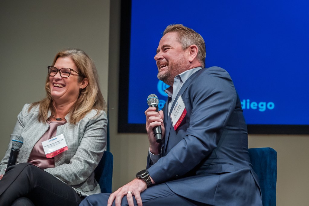 (Left to right) Tina Shields, Water Department manager for the Imperial Irrigation District, and Dan Denham, general manager at the San Diego County Water Authority at Politifest 2023 on Oct. 7, 2023. / Photo by Vito di Stefano for Voice of San Diego