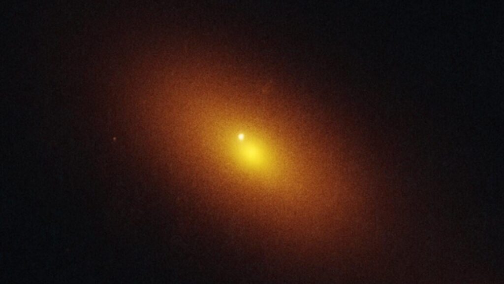 A star has been destroyed by a wandering supermassive black hole | Second supermassive black hole is a long way from the galaxy's core.