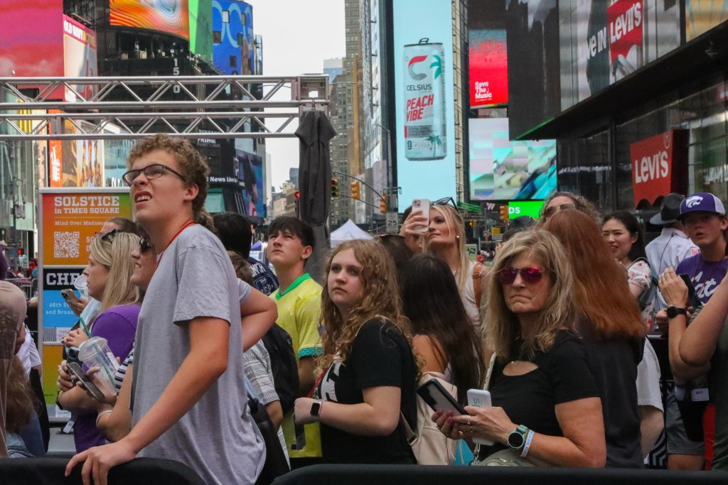 Tourists packed into Times Square.