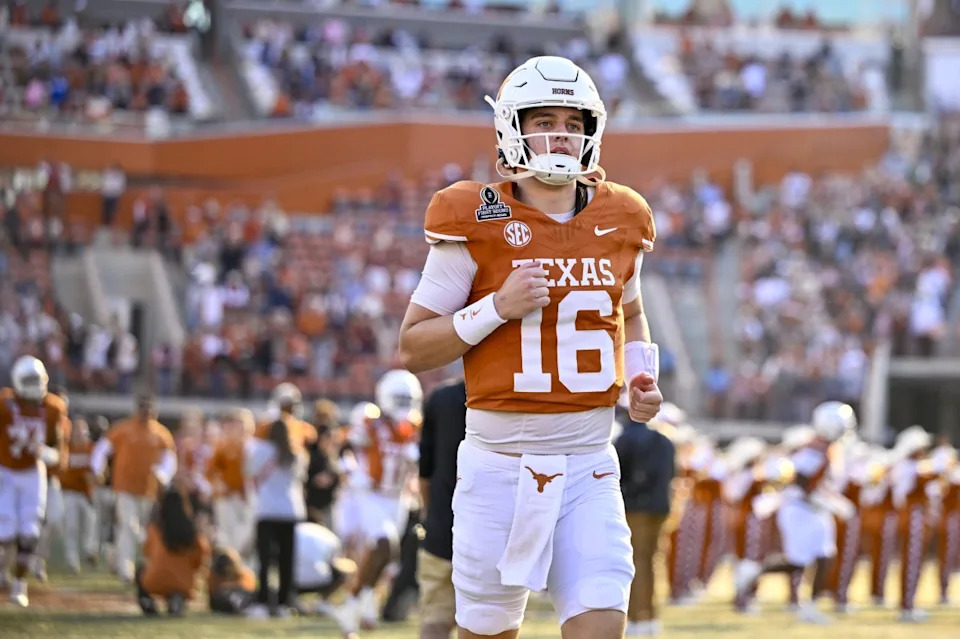 Texas Longhorns quarterback Arch Manning takes the field before his team's College Football Playoff game against the Clemson Tigers at Darrell K Royal-Texas Memorial Stadium on Dec. 21, 2024.Jerome Miron-Imagn Images