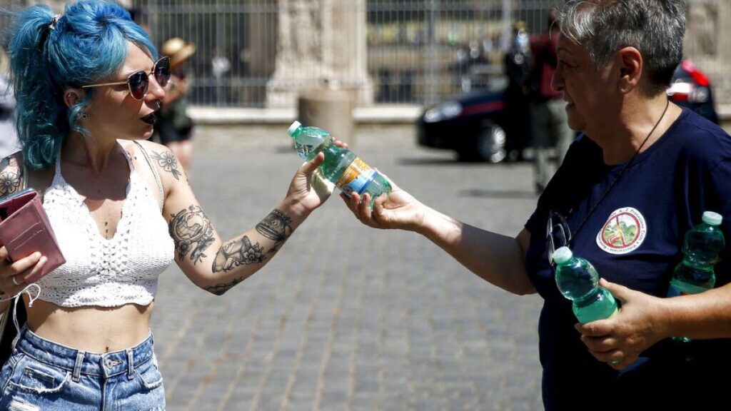Italy and Spain bake in heatwave as cities issue red alerts and regions mull work bans