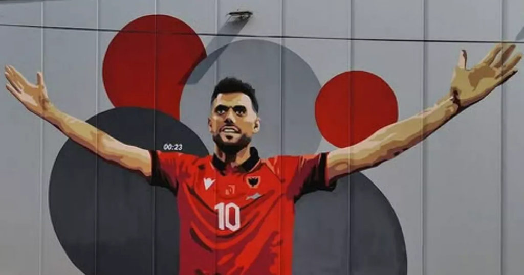 Nedim Bajrami’s Rangers woe a world away from Albania hero status as Euros record breaker honoured with special mural Ipso logo