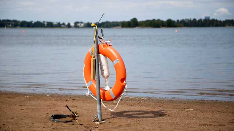 Lifebuoy on a beach.