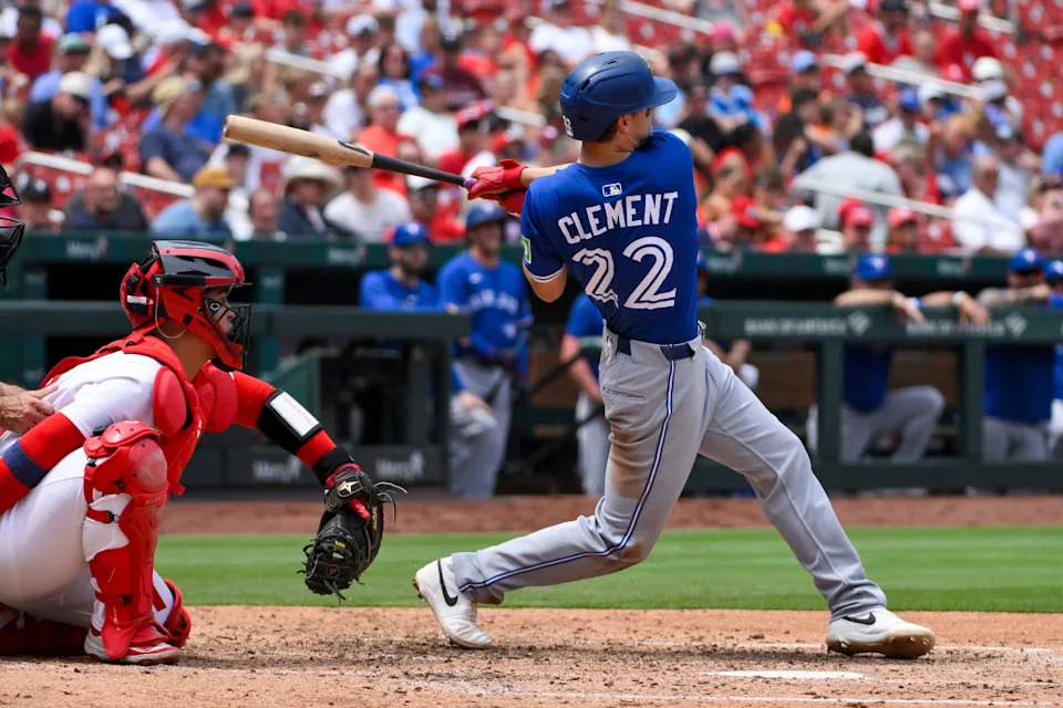 Blue Jays third baseman Ernie Clement (22) hits a solo home run against the Cardinals.Jeff Curry-Imagn Images