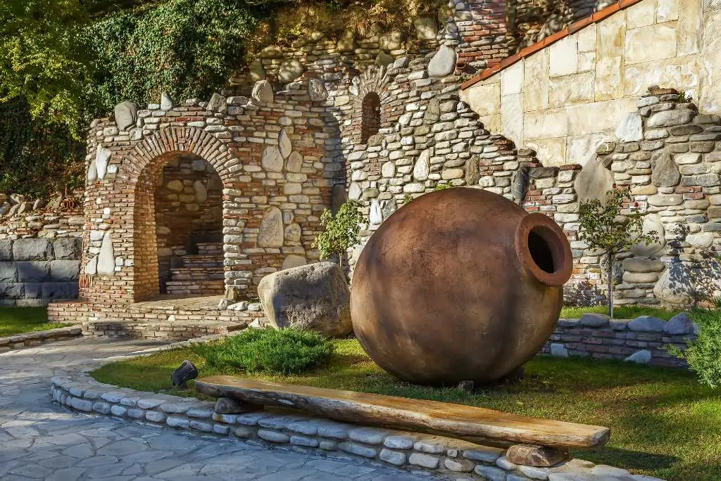 clay qvevri in front of a winery in Georgia.