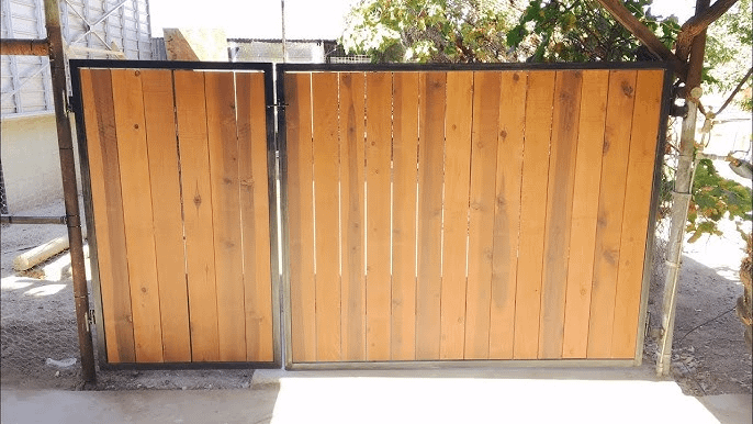 Field metal / wooden fence and gate.
