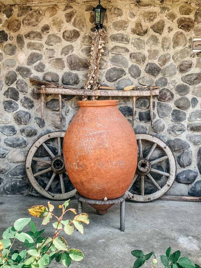 The Qvevri is a clay heart buried in the earth.Within it, wine is born through the union of sun, soil and love.Its not merely a vessel- it's a voice of time, the breath of tradition and the soul of Georgia.