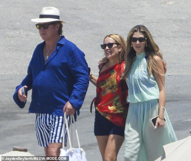 Richard Wilkins attended the bash with his girlfriend Mia Hawkswell, who was pictured walking into the party with her arm around the bride